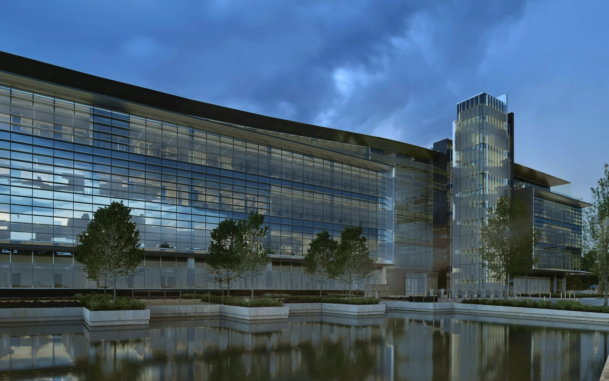 Illustrative photograph: an office building at first light