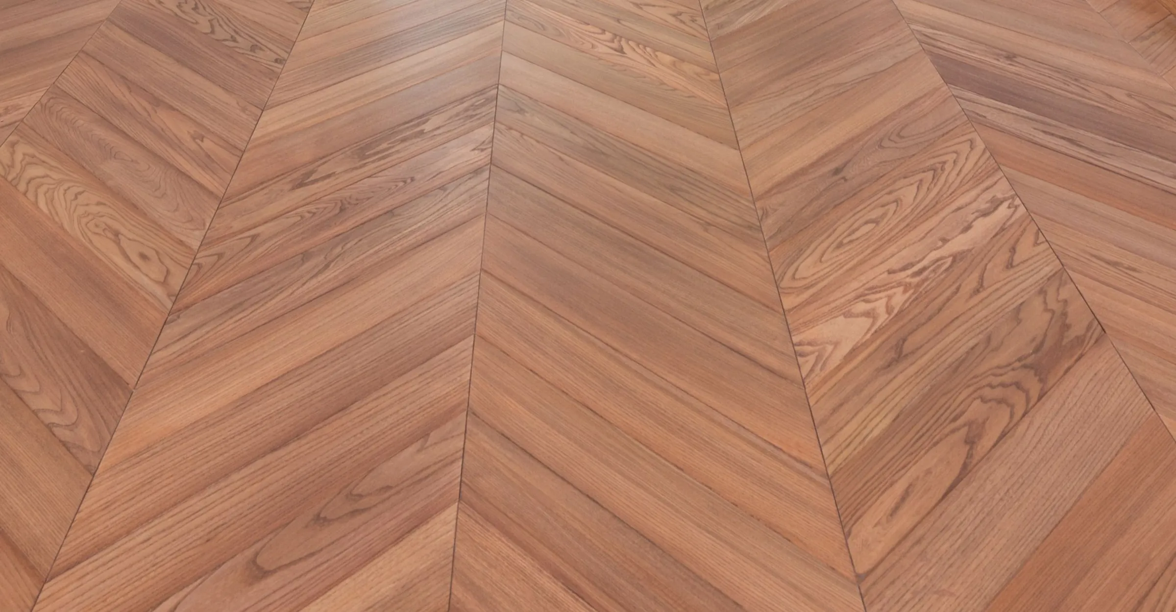 Illustrative photograph: a chevron hardwood floor with a satin sheen