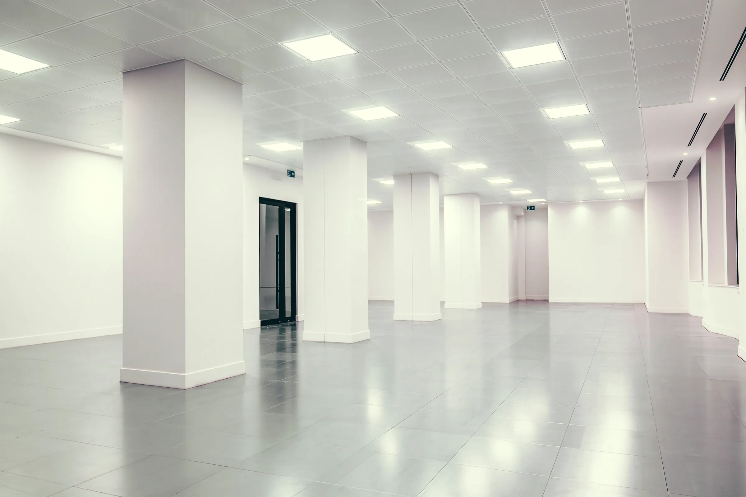 Illustrative photograph: an empty, newly finished office floor